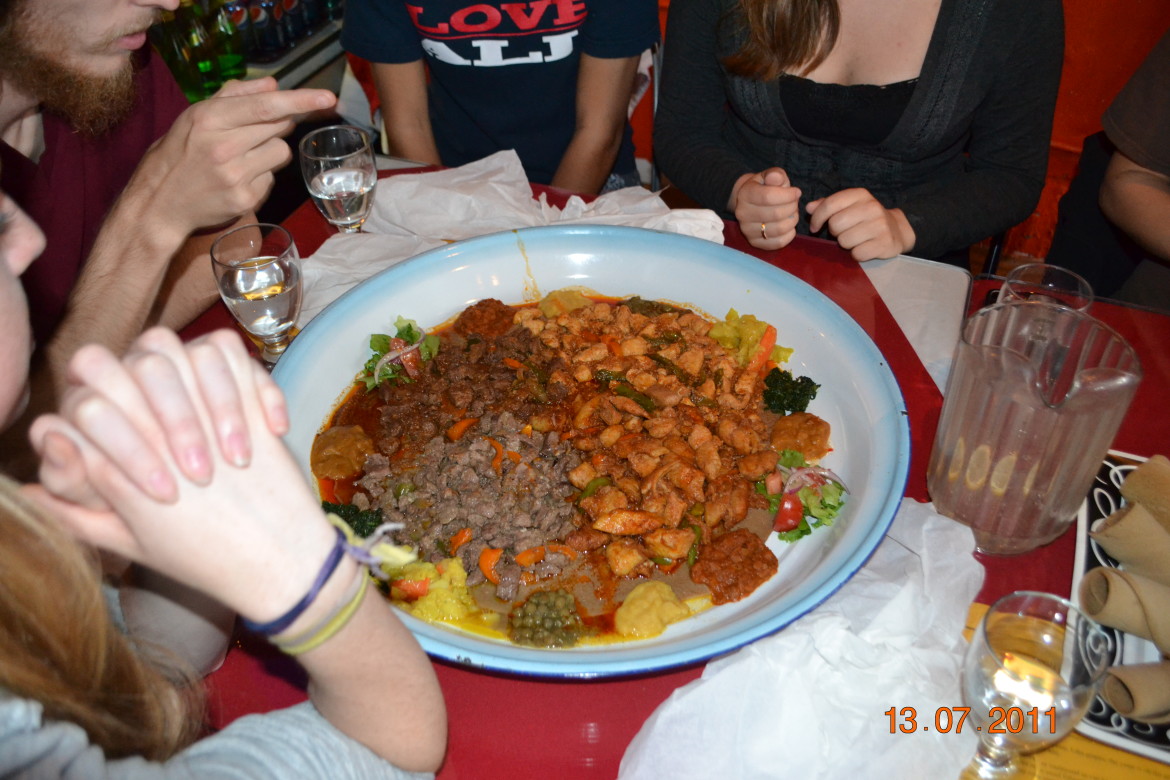 Eating together at an Ethiopian restaurant in Vancouver